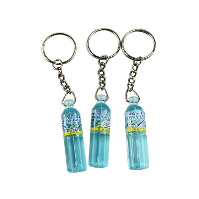 China Water Bottle Creative Mineral Shape Gift Key Decoration Advertising Plastic Acrylic Key Chain for sale