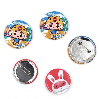 China Custom Different Design Funny Button Tin Round Shape Button Badge Nickel Free Badge With Own Logo for sale