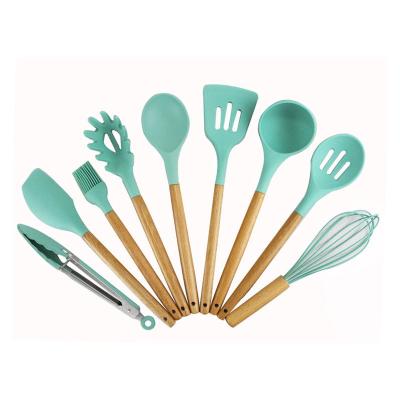 China Sustainable Functional 9 Pieces Set Silicone Cookware Set With Wooden Handle Kitchen Utensil Set for sale