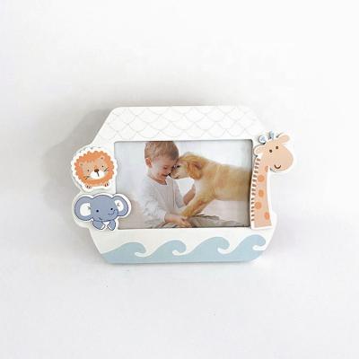 China Low MOQ Lovely Cartoon Cartoon Wooden Photo Frame For Baby In Living Room for sale