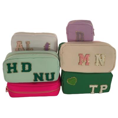 China Fashion RTS Mini Cute Toiletry Bag Cosmetic Stock Make Up Organizer Waterproof Pouch For Women Girls Make Up Nylon Pouch Cosmetic Bags for sale