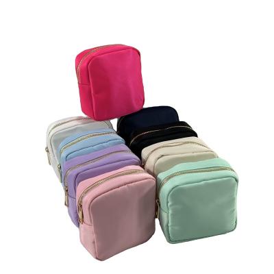 China Low MOQ Fashion New Products 11 Colors Custom Nylon Toiletry Bag Gift DIY Pouch Custom Cute Makeup Bag for sale