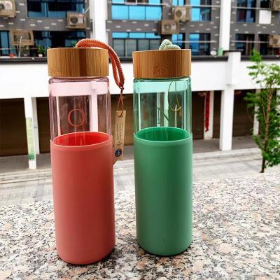 China Viable Custom Glass Coffee Cup Lids For Reusable Leak Proof Mugs Travel Glass Cup With Lid for sale