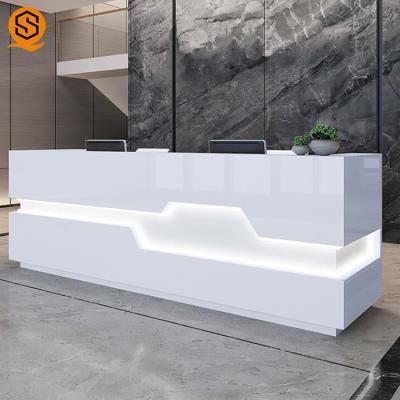 China Mostrador de recepción blanco del salón de la luz del LED con el material superficial sólido en venta