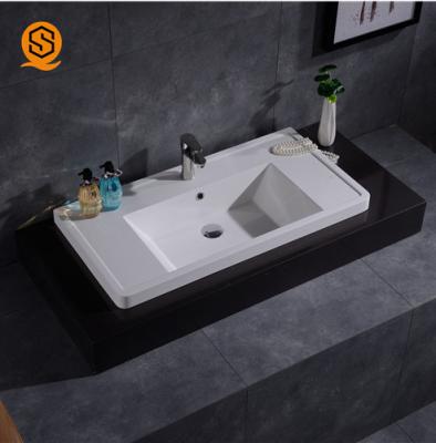 China Lavabo superficial sólido del diseño linear debajo del lavabo contrario en venta