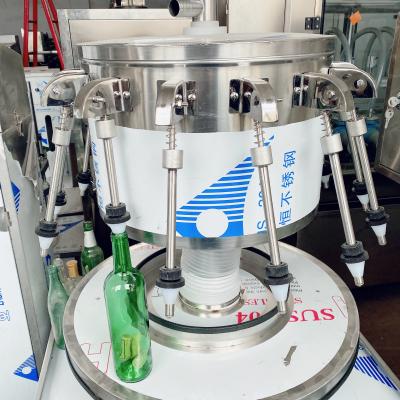 China Glass Beverage Wine Bottle Filling Machine Voltage 220V/380V 2000pcs Per Hour for sale