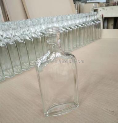 China Sustainable flat gin glass bottles wholesales 200ml for sale