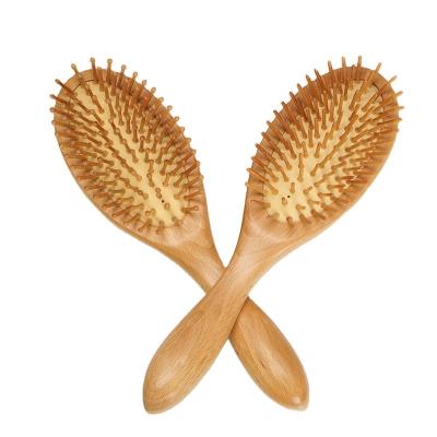 China Cushion Metal Bristle Beech Wood Massage Brush for sale