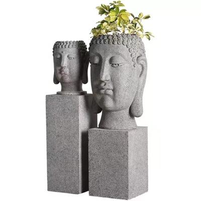 China The stable fiberglass flower pot with Buddha head is used to decorate the fiberglass flower pot in family villa for sale