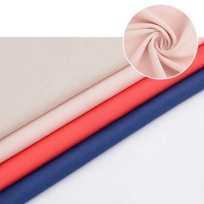 China Soft Touch Jacquard Textile Fabric Antistatic Plain Dyed Elastic Jersey Solid Plain Recycled Polyester for sale