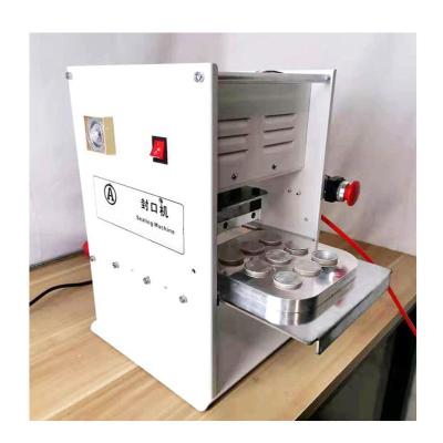 China Food Manual 2 4 6 Cavity 37mm Dia Aluminum Foil Nespresso Coffee Capsule Heat Sealing Machine For Sale for sale