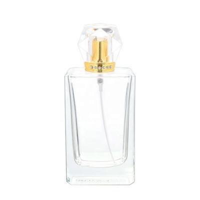 China Travel 50ml 1.7oz Cosmetic Clear Glass Square Spray Empty Fancy Perfume Bottle With Acrylic Cap for sale