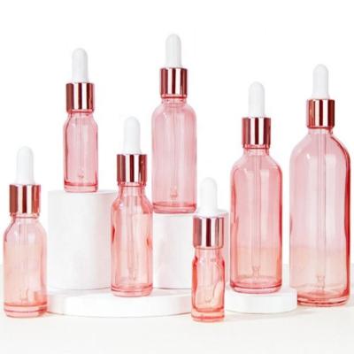 China Cosmetic Push Button Flat Shoulder Essential Oil Bottle Customize Frosted Cosmetic Glass Dropper Bottle for sale