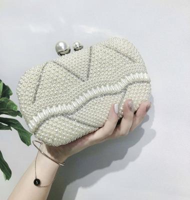 China Fashionable Fascinating Handmade Pearl Frame Women Ladies Portable Clutch Bag Wedding Evening Clutch Bags for sale