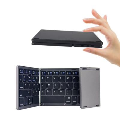 China Wireless Mini Rechargeable Pocket Foldable Ultra Thin Three Fold Wireless Keyboard With Touchpad for sale