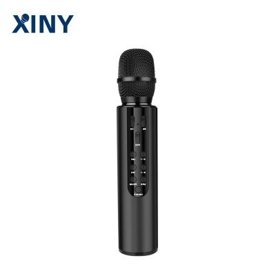 China Portable Handheld Wireless Karaoke Microphone Xiny Speaker Home KTV Player Record Function for sale