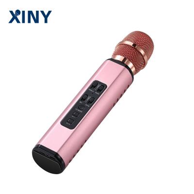 China Multifunctional Xiny Amazon Wireless Microphone Hot Sales Portable Handheld Wireless Karaoke Speaker for sale