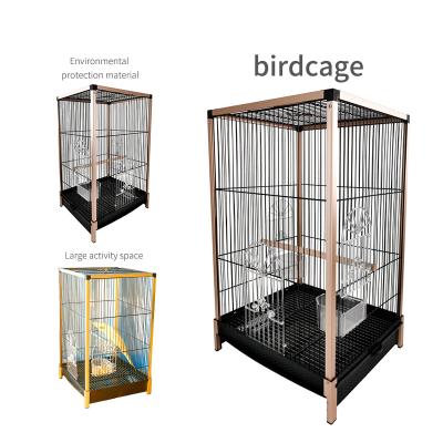 China Sturdy Stocked Gold Fashion Luxury Parrot Cage Portable Sturdy Portable Cage With Stand for sale