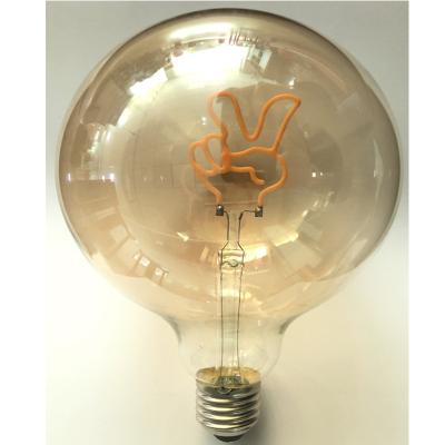 China LANDSCAPE OFFICE GARDEN PARK Customized Dimmable light110V 220V E27 E26 decoration G40 G125 amber glass warm soft letter love heart led filament bulb for sale