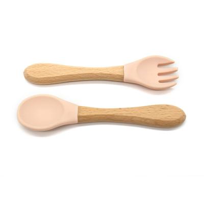 China BPA Free New Arrival Can Be LOGO Wholesale Price Fashion Design Custom Approval Baby Silicone Spoon With Wooden Handle for sale