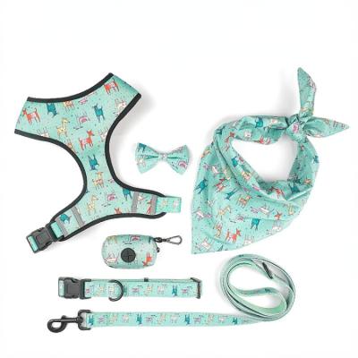 China Stocked Custom Design Dog Harness with Matching Collar Leash Bow Tie and Bandana Set Reversible Dog Harness Vest for sale