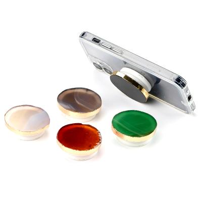 China Adjustable Custom Gem and Onyx Handle Beautiful Colored Onyx Sliced ​​Druzzi Automatic Phone Grip for sale