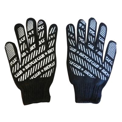 China Anti-slip accept wear-resistant offset printing LOGO and durable black cotton dotted gloves with PVC dots for sale