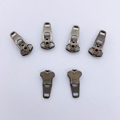 China Other Factory Supply Zipper Double Lock Slider Stainless Steel 45 YG Zipper Sliders New Design Anti Brass Plated for sale