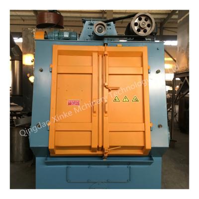 China Advanced design Qingdao Xinke Specialized Tumbling Rubber Belt Shot Blasting Sandblasting Machine for sale