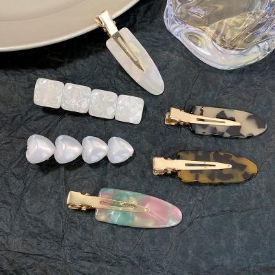 China Fashionable wholesale acrylic plastic barrettes like leopard print acrylic resin transparent women hairpin for sale