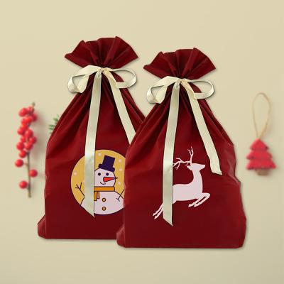 China Recyclable Kids Wedding Holiday New Year Christmas Decorations Santa Christmas Drawstring Gift Bag for sale