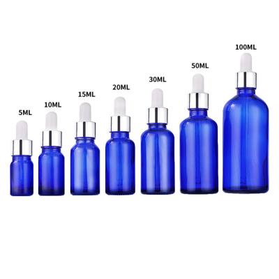 China 5ml 10ml 15ml 20ml 30ml 50ml 100ml Glass Bottle Essential Oil Cobalt Blue Essential Oil Cosmetic Blue Clear Bottles for sale