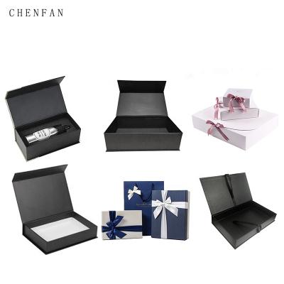 China Recyclable Custom Hot Stamp Printed Logo Black Foldable Rigid Magnetic Large Cosmetic Gift Boxes Luxury Clothing Boxes Cardboard Box With Bow for sale