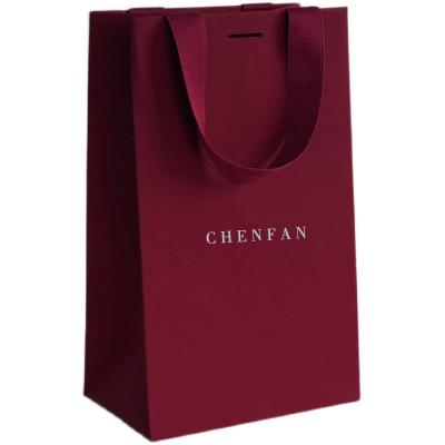 China Custom Recyclable Product Package Bags Bolsas De Papel Merchandise Bags for sale