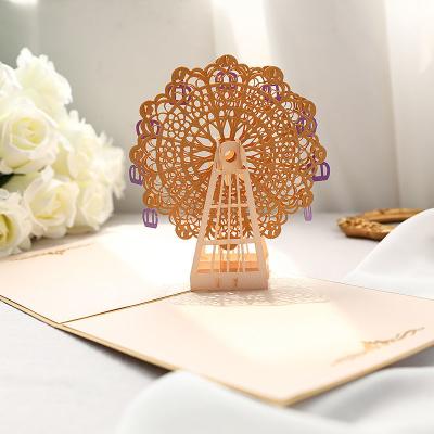 China Custom Handmade Christmas Pop Of Europe 3D Graduation Birthday Wedding 3D Holiday Greeting Cards Ferris Wheel Greeting Card Happy for sale