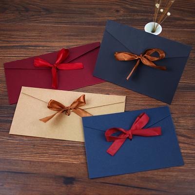 China Brown Paper Material High Grade Recyclable Paper Wrap Blank Gift Wrap With Ribbon for sale