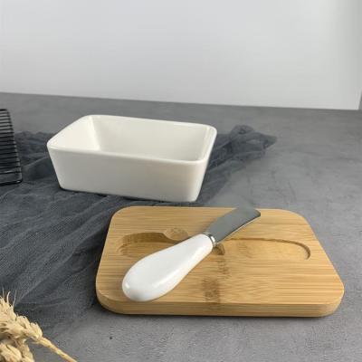 China Hot Selling Steamable Amazon Butter Box With Bamboo Airtight Lid Ceramic Butter Dish With Knife for sale