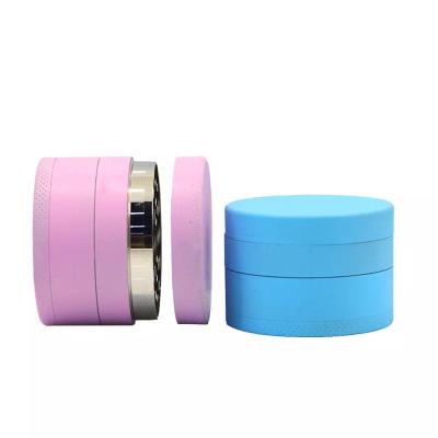 China Yiwu JUJI 2022 Design 50mm Zinc Smoke Grinder Sharp Teeth CNC New Logo Glow In The Dark Custom Herb Grinder With Luminescent Painting for sale