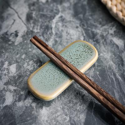 China Green Glazed Ceramic Disposable Porcelain Hotel Restaurant Dinnerware Design Porcelain Chopstick Rest Chopstick Rest For Serving for sale