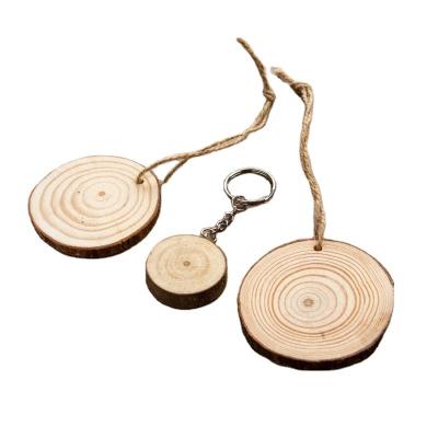 China Europe Handmade Wooden Unfinished Predrilled Slice Kit Wood Key Chain Slices with Hole Circles Wood Shaft for Arts and Crafts for sale