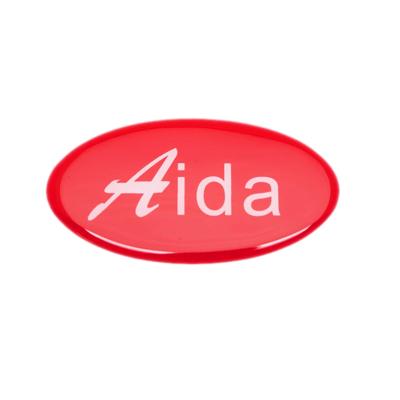 China Waterproof Red Aida Sticker Epoxy Resin Label In Top Lightweight Patch for sale