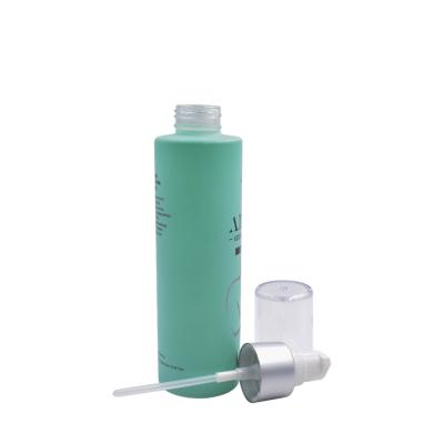 China Personal Care Matte Glass Bottle 100ml 120ml 150ml Green Lotion Bottle Glass With Clear Silver Pump Above Cap for sale