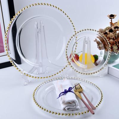 China New Viable Arrive Gold Thin Layer Transparent Luxury Creative Creative Chargers Eco-friendly Clear Glass Dish for sale