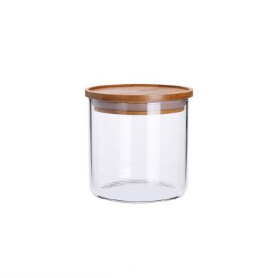 China Food Customized Borosilicate Glass Storage Bottle Top Cheap Jar Storage Jar With Wooden Lid for sale