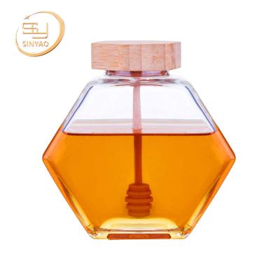 China Wholesale Sustainable Clear Empty Hexagon Honey Glass Jar With Lid for sale