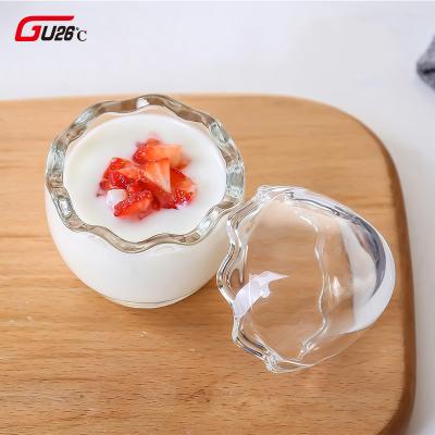 China Creative Design Egg Glass Cups 100ML Glass Heat Resistant Milk Bottles With Lid Yogurt Bottles Kitchen Storage Jar Party Dessert Glass Cup for sale