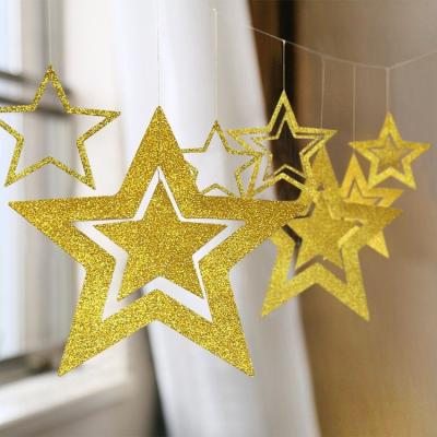 China Festival Decoration Cavity Star Party Supplies Wall Hanging Decor New Year Christmas Decorations Hang Paper Garland Twinkle Star Banner for sale