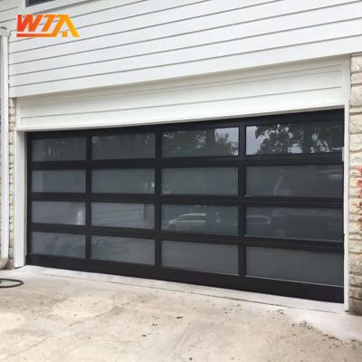 China Windproof Automatic Black Aluminum Frosted Glass Sectional Residential Garage Door for sale