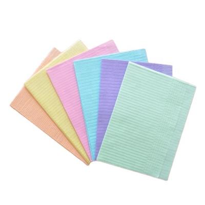 China Clinic Pink Dental Bib Disposable Blue Green Waterproof Dental Bibs for sale