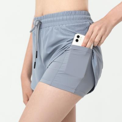 China Wholesale OEM Women Yoga Shorts Breathable Workout Running Sports Shorts Zipper Side Pockets Lightweight Breathable Shorts for sale